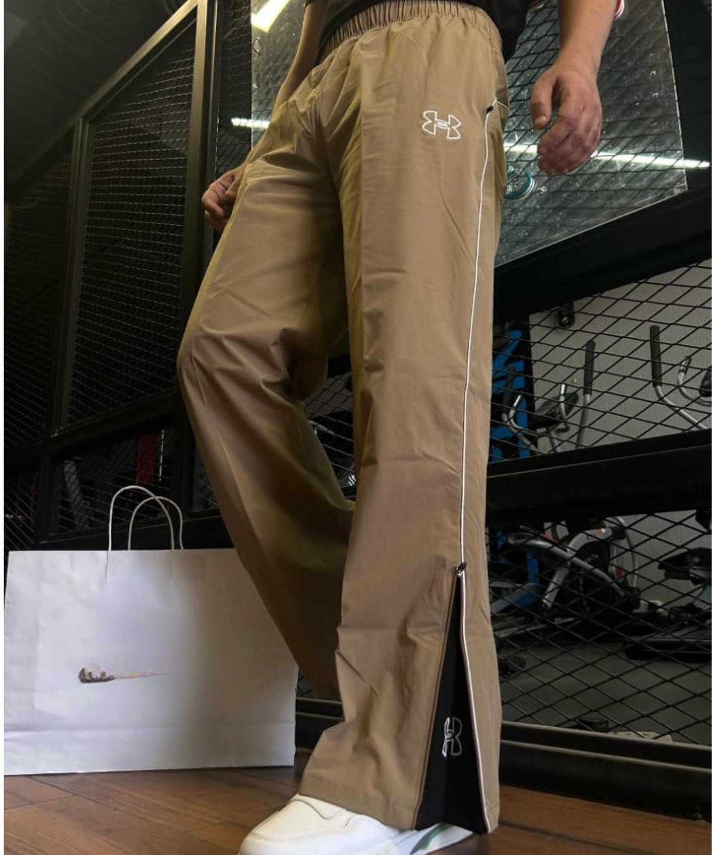 Imported Nylon Crush Lycra | Straight Fit + Boot Cut | Ankle Zipper | Side Pocket Closure | Lower / Trackpant